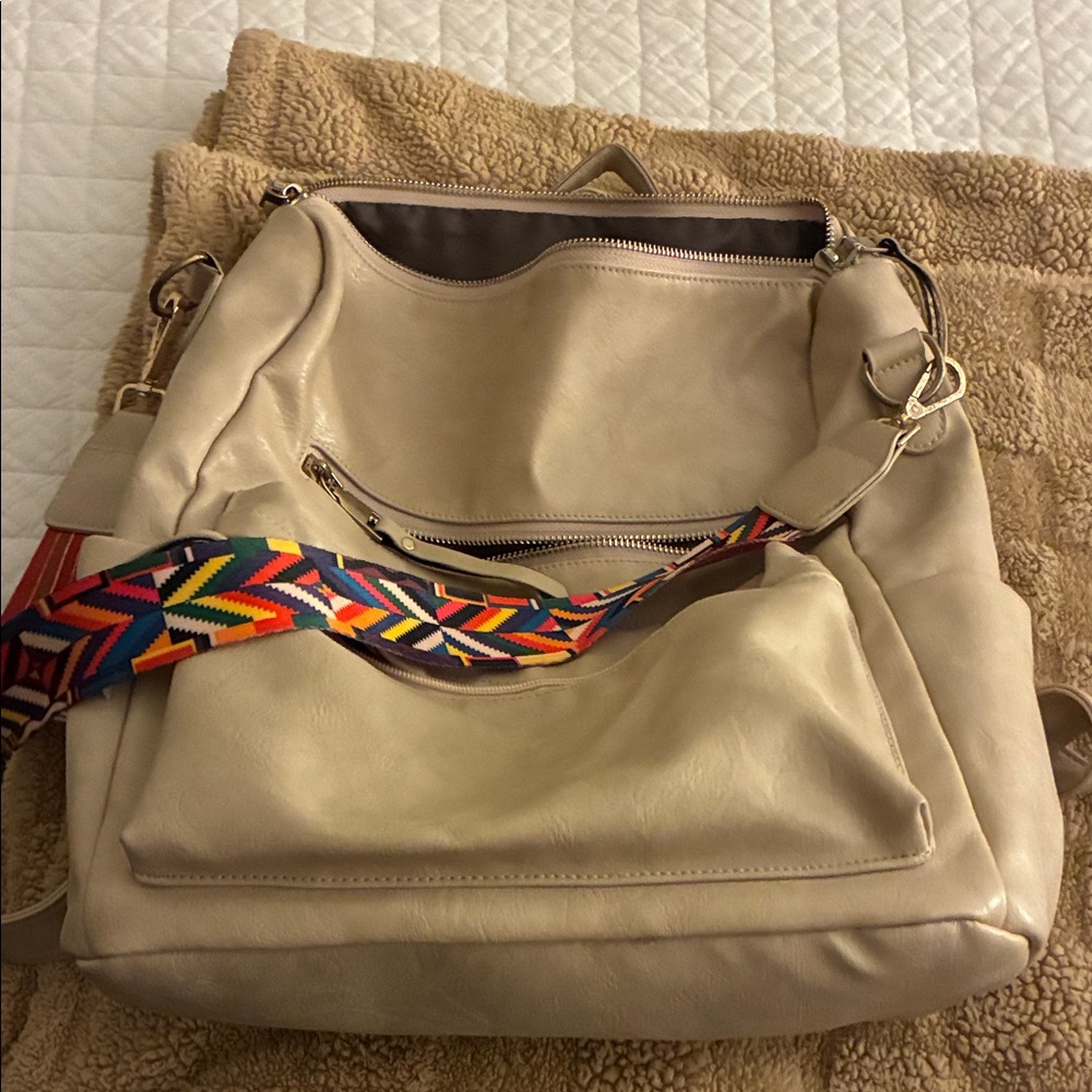 Stylish Cream Backpack with Colorful Strap